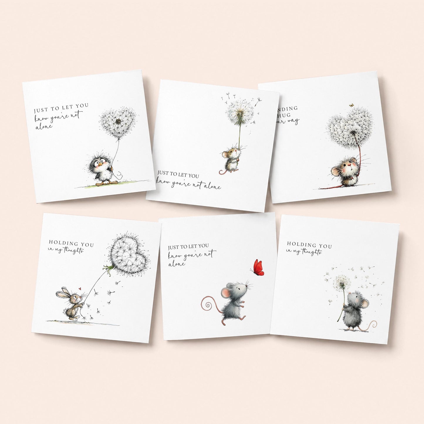 Pack of 6 sympathy and thinking of you cards with dandelion illustrations featuring mice and rabbit, printed on 300gsm card