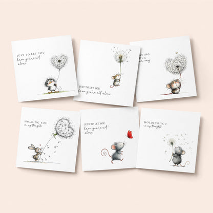 Pack of 6 sympathy and thinking of you cards with dandelion illustrations featuring mice and rabbit, printed on 300gsm card