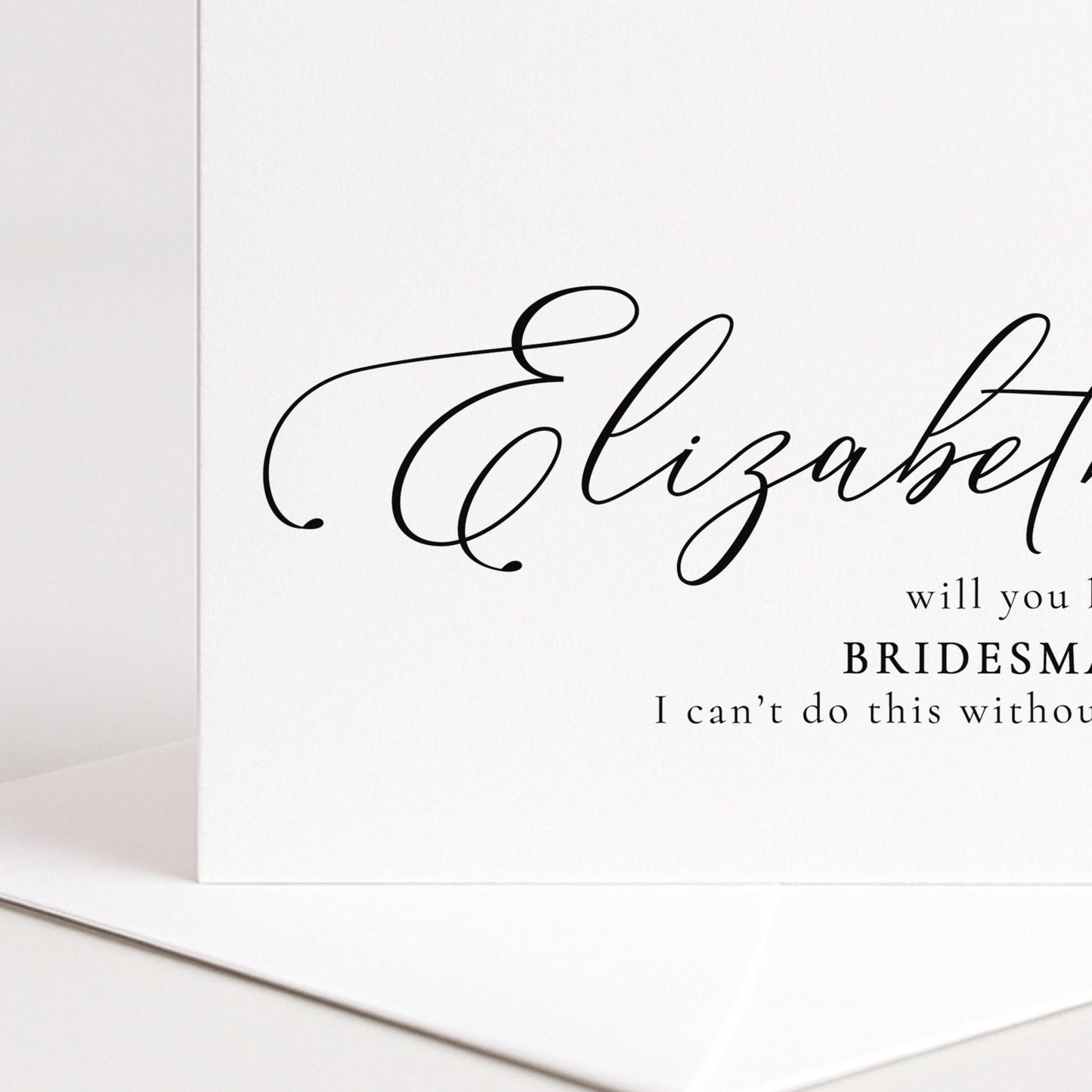 Whimsi Lilley bridesmaid proposal card with "Will You Be My Bridesmaid" message on elegant white cardstock.