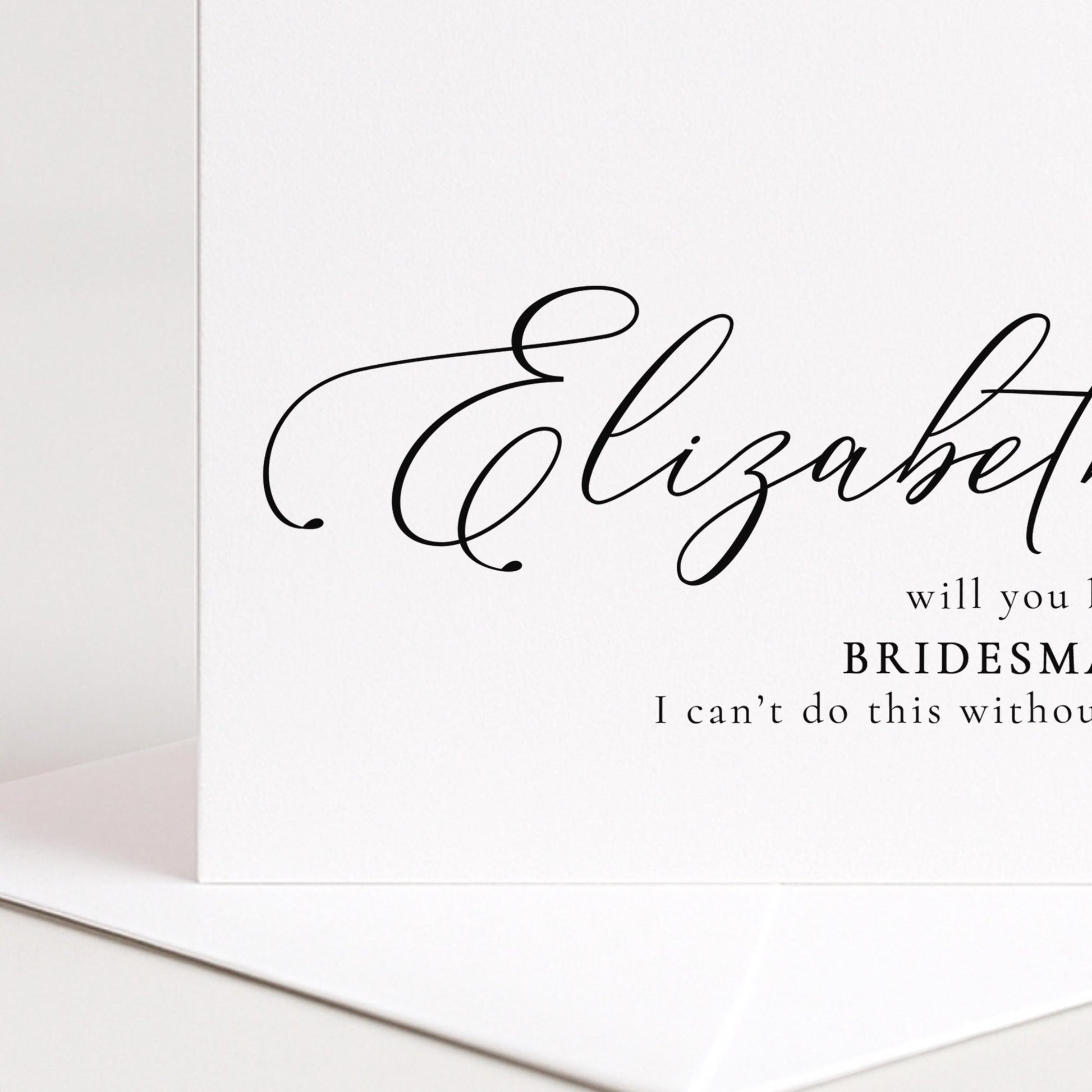 Whimsi Lilley bridesmaid proposal card with "Will You Be My Bridesmaid" message on elegant white cardstock.