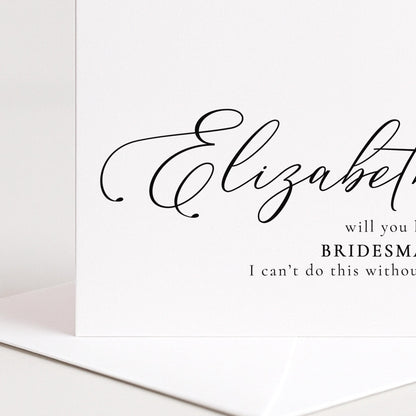 Whimsi Lilley bridesmaid proposal card with "Will You Be My Bridesmaid" message on elegant white cardstock.