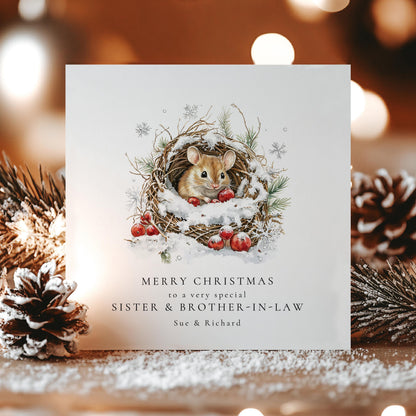 Personalised Christmas card for sister and brother in law with snowy mouse illustration and names, printed on 300gsm card