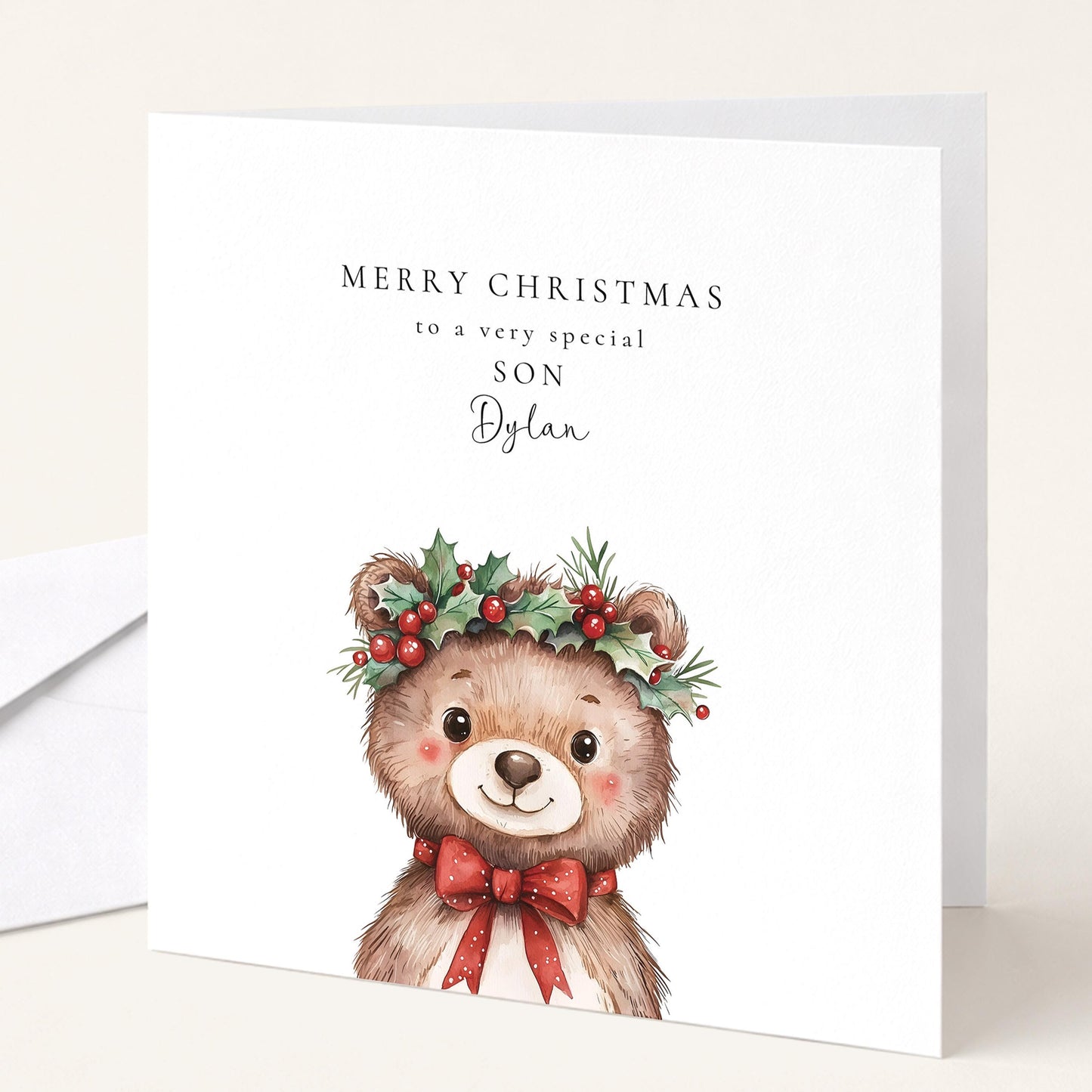 Cute holly crown bear Christmas card for a special son, personalised with his name, printed on 300gsm card