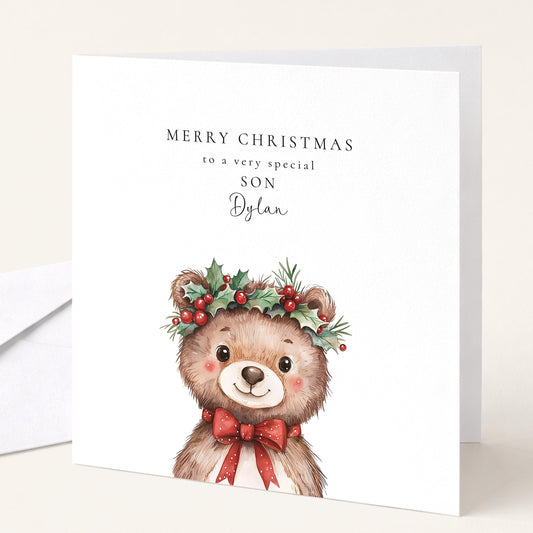 Cute holly crown bear Christmas card for a special son, personalised with his name, printed on 300gsm card