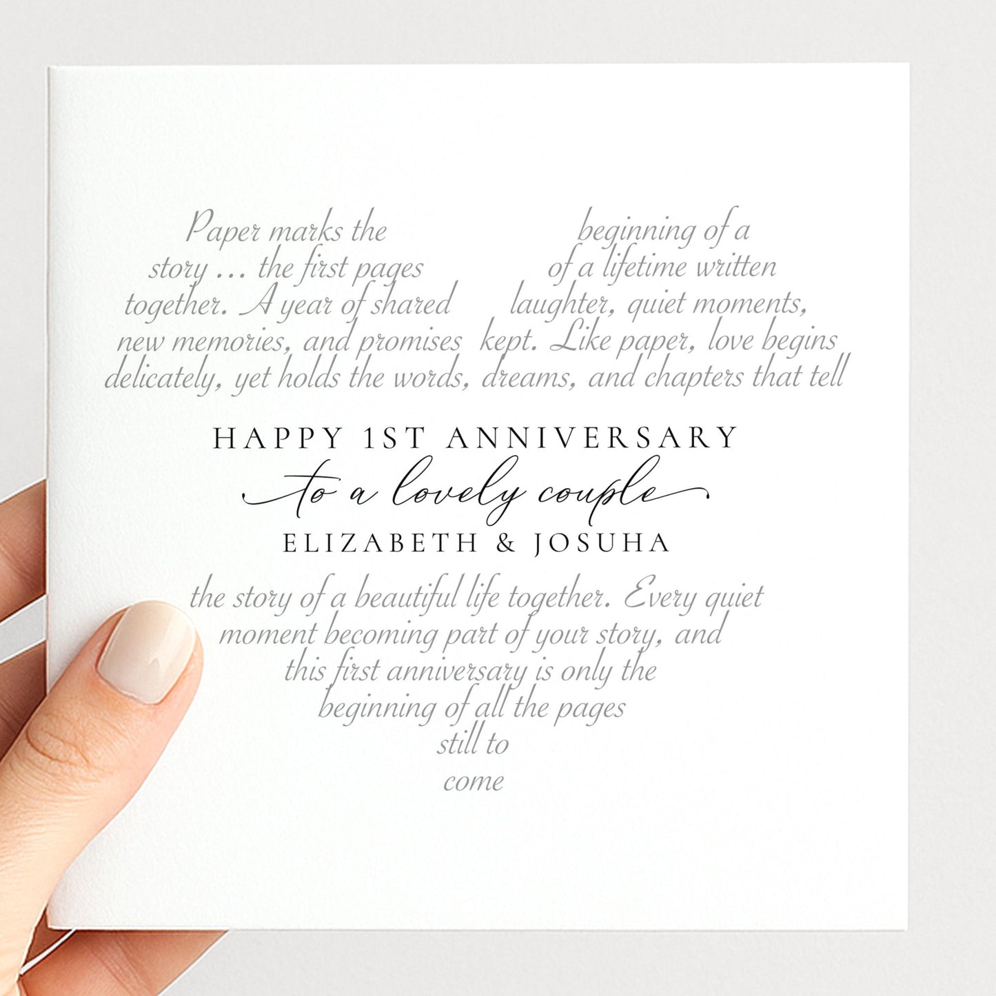 Personalised first anniversary card for a couple with elegant heart shaped poem and both names, printed on 300gsm card