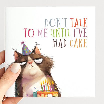 Funny cat birthday card by Whimsi Lilley featuring a humorous design and the message "Don't Talk To Me Until I've Had Cake."