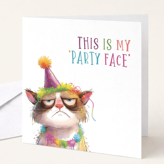 Funny cat birthday card titled "This Is My Party Face" by Whimsi Lilley, featuring a humorous cat illustration for celebrating birthdays.
