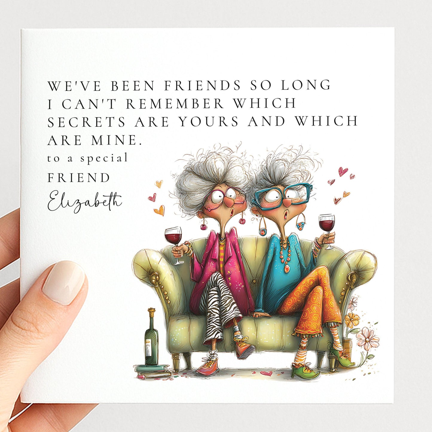Funny personalised birthday card for friend with two wild older women sharing wine on a sofa captioned secrets are yours and mine
