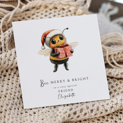 Bee Merry & Bright Christmas Card, Cute Bee Xmas Card for Friend, Personalised Name Card, Festive Bee Holding Gift, Custom Printed Card UK