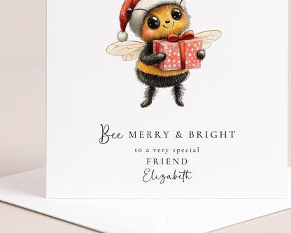 Bee Merry & Bright Christmas Card, Cute Bee Xmas Card for Friend, Personalised Name Card, Festive Bee Holding Gift, Custom Printed Card UK