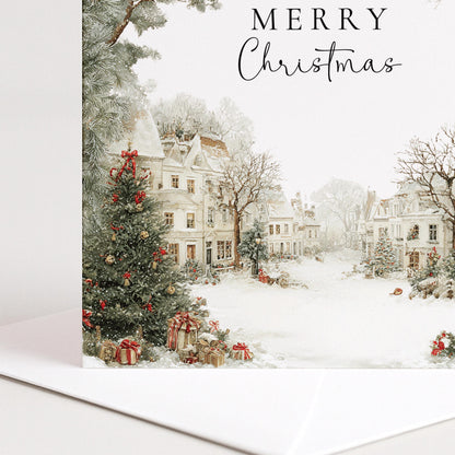 A charming snowy village Christmas card, personalised with names, printed on 300gsm card