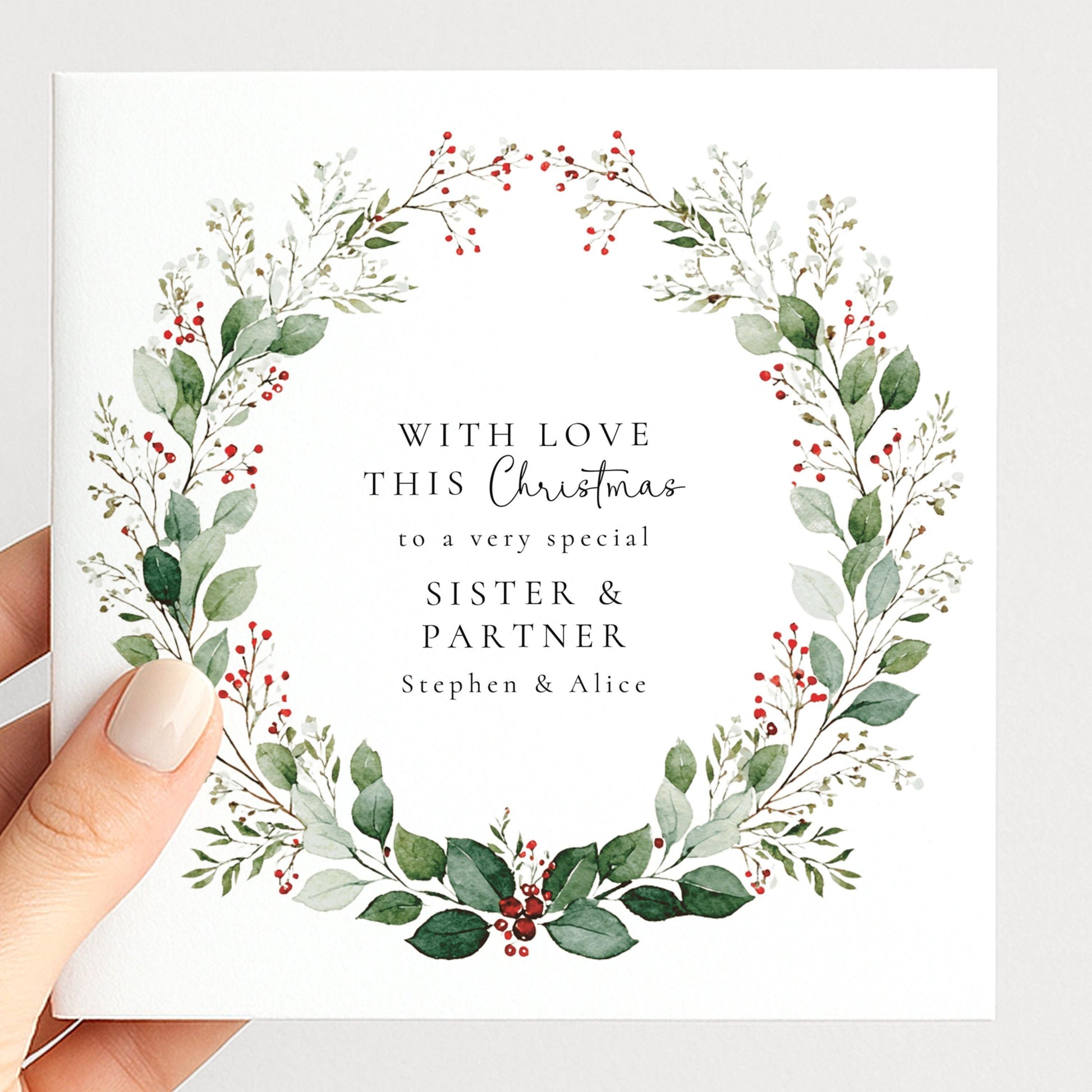 An elegant festive wreath Christmas card, personalised with names, printed on 300gsm card