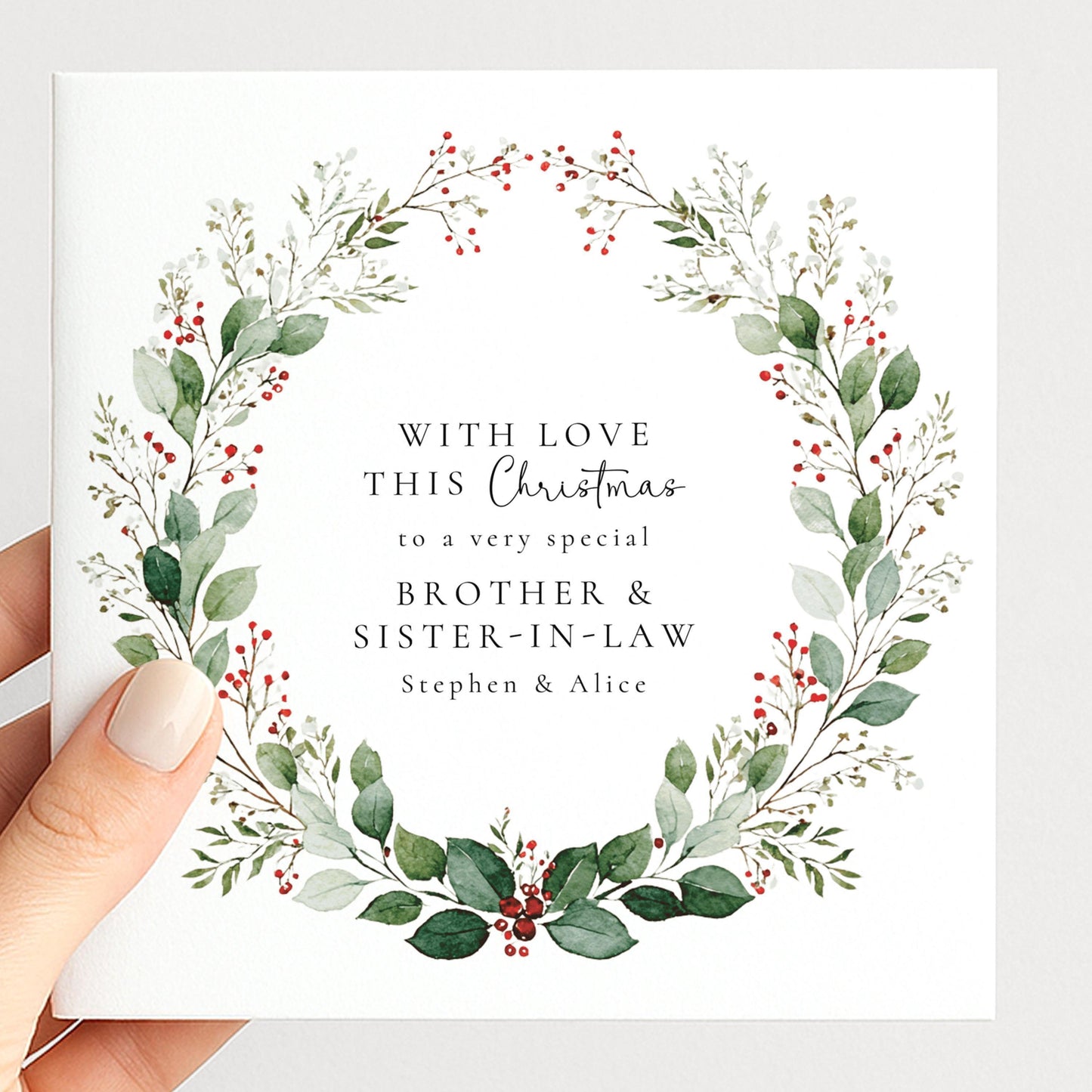 An elegant festive wreath Christmas card for family, personalised, printed on 300gsm card