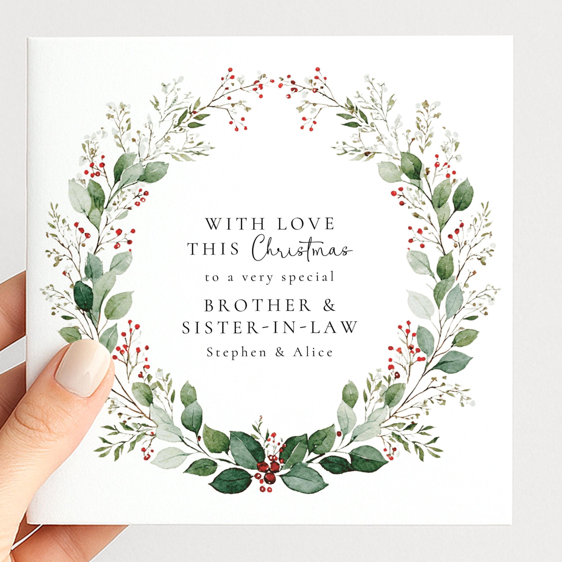 An elegant festive wreath Christmas card for family, personalised, printed on 300gsm card
