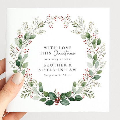 An elegant festive wreath Christmas card for family, personalised, printed on 300gsm card