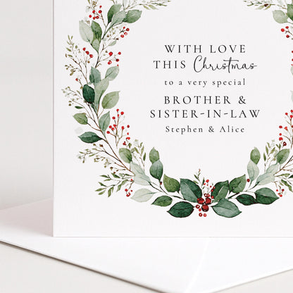 An elegant festive wreath Christmas card for family, personalised, printed on 300gsm card