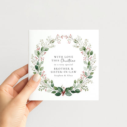 An elegant festive wreath Christmas card for family, personalised, printed on 300gsm card