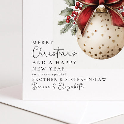 A festive bauble Christmas card for brother & sister-in-law, personalised, printed on 300gsm card