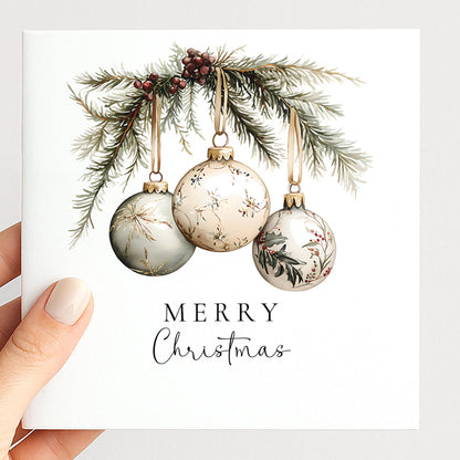 An elegant hanging bauble Christmas card, personalised with custom names, printed on 300gsm card
