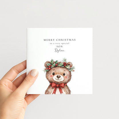 Cute holly crown bear Christmas card for a special son, personalised with his name, printed on 300gsm card