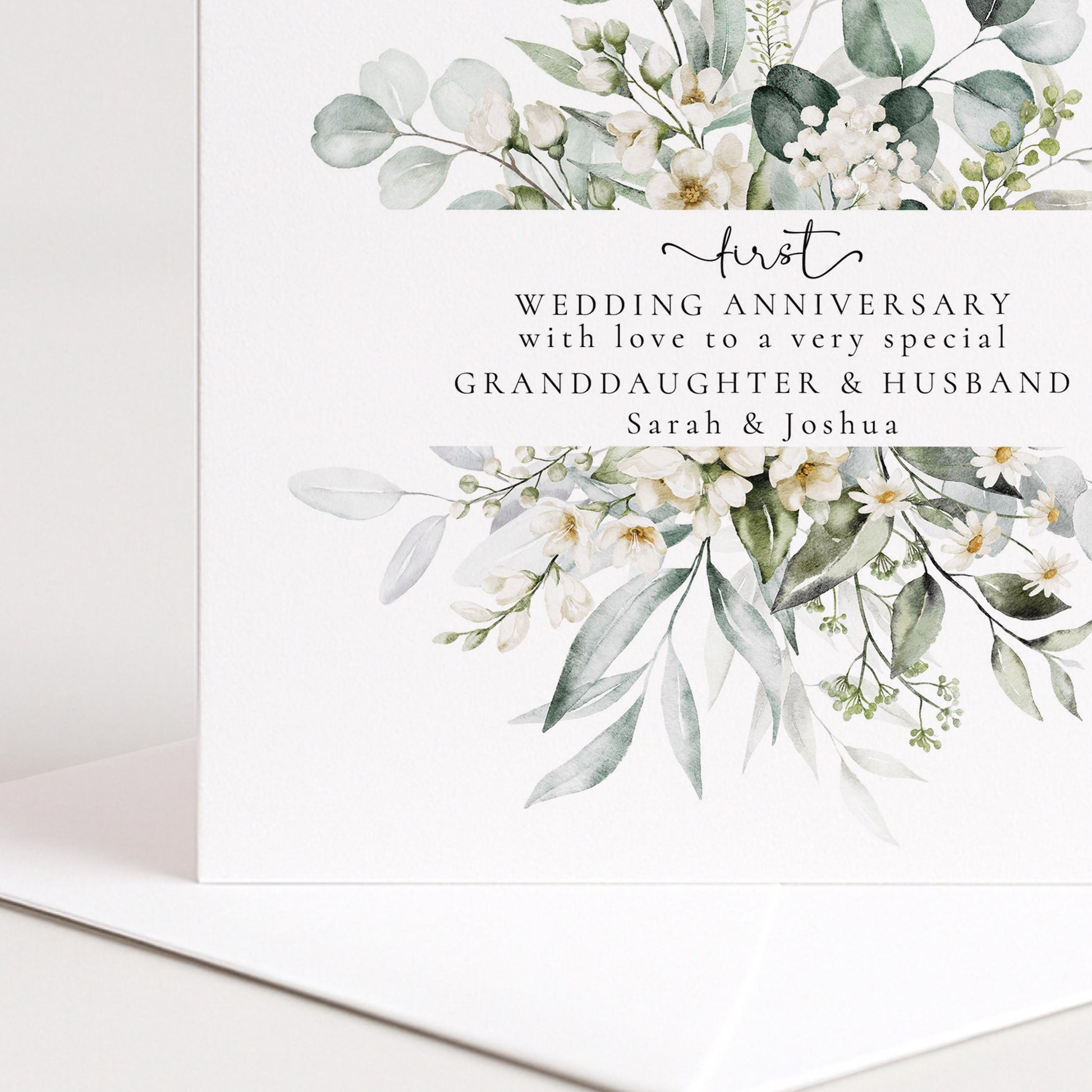 A delicate floral anniversary card for granddaughter & husband, personalised with names, printed on 300gsm card