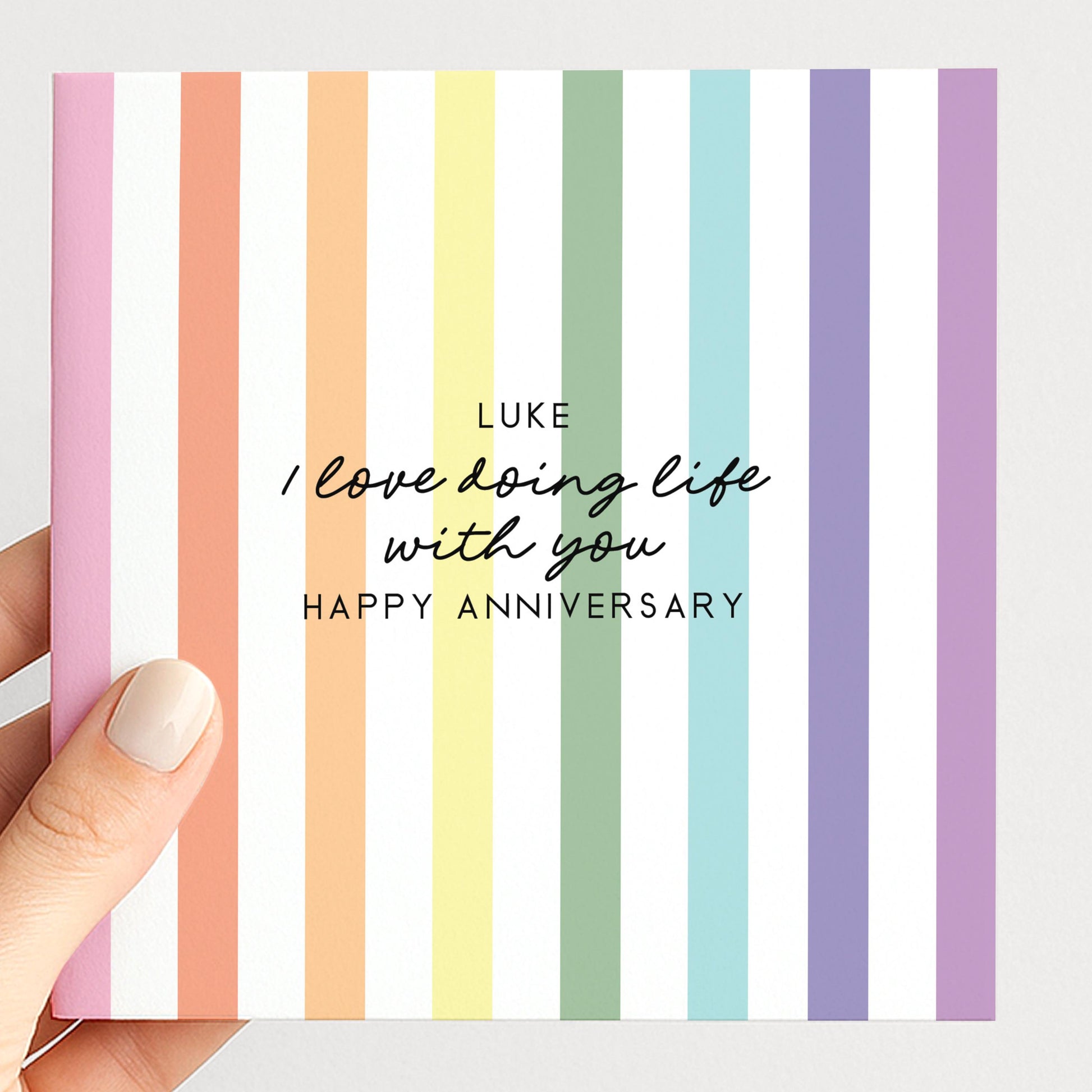 Personalised anniversary card with pastel rainbow stripes and I love doing life with you sentiment, printed on 300gsm card