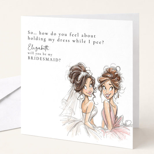 Brunette bride holding a "Will You Be My Bridesmaid" card from Whimsi Lilley, featuring floral accents and elegant script design.